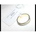 An 18ct gold designer wedding band