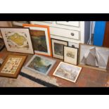 A selection of framed pictures, including a map of