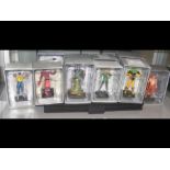 Ten boxed Marvel figures with stand