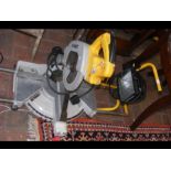 A circular saw, together with a workshop light