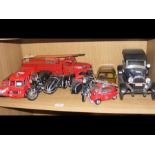 A collection of die cast vehicles, including Fire