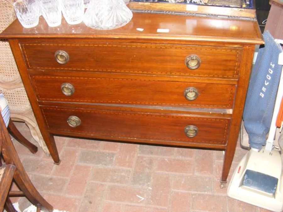 An Edwardian chest of drawers