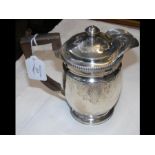 A 17cm high silver coffee pot - London hallmark