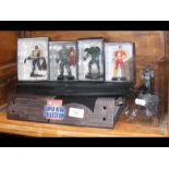 A selection of 5 boxed DC figures with stand i