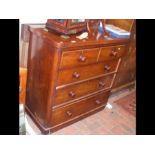 A cap top Victorian chest of drawers