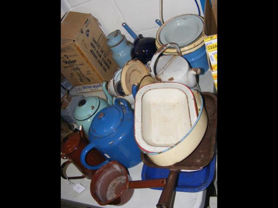 A selection of vintage enamel tea pots etc