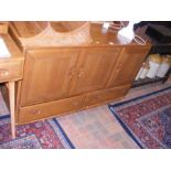 A retro Ercol 'Golden Dawn' sideboard with drawers