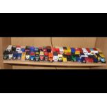 Selection of die cast model cars - on one shelf