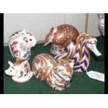 Five Royal Crown Derby paperweights including seah