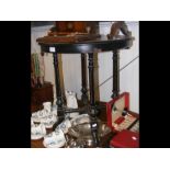 An ebony and walnut veneered occasional table