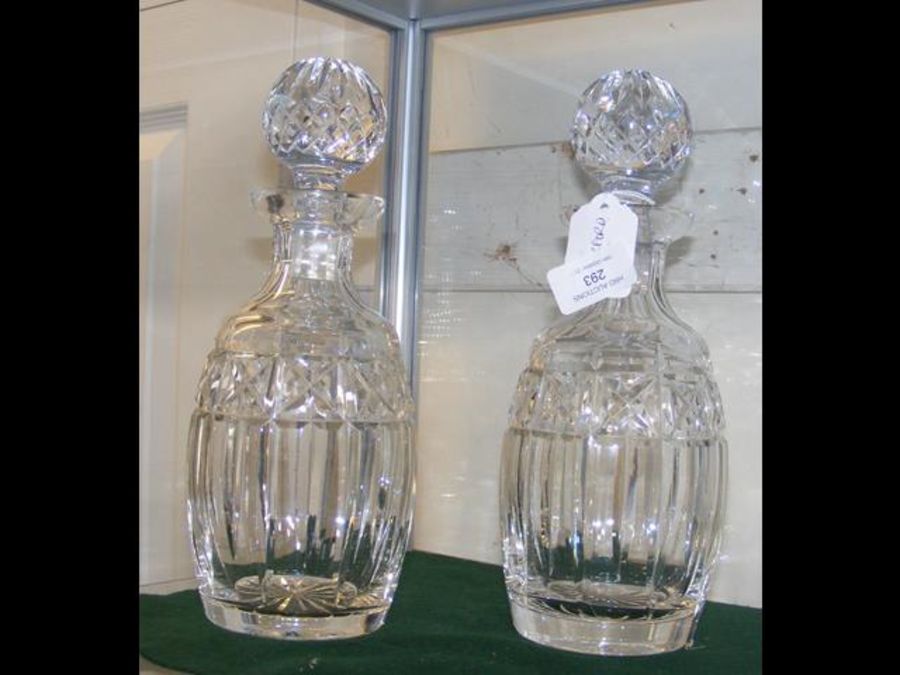 A pair of Waterford crystal cut glass decanters wi