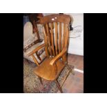 An antique slat-back country chair