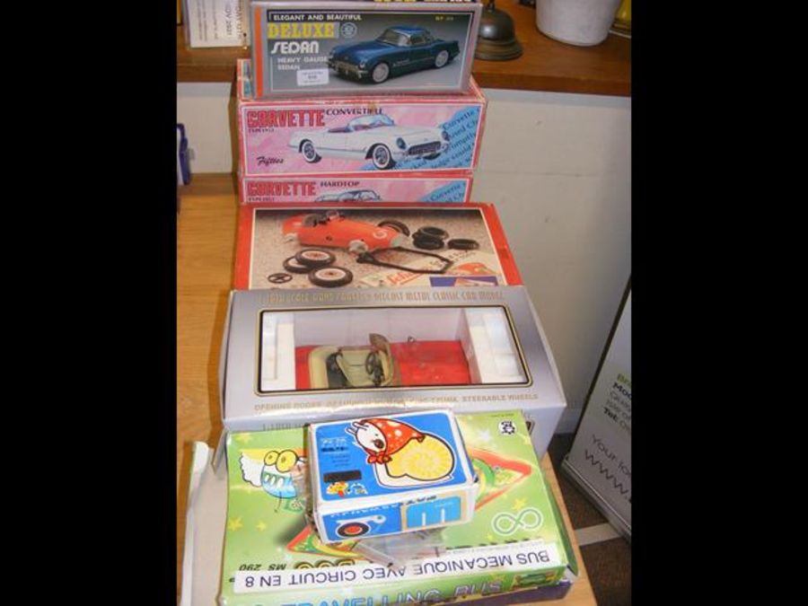 A boxed model Sedan vehicle, together with Corvett