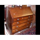 A Georgian mahogany fall-front bureau with fitted