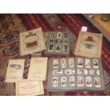 Assorted cigarette cards in folders and presentati