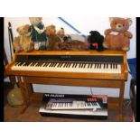 A Hohner Clavinet DP1 in light wood case