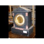 A small Victorian slate and marble mantel clock