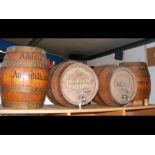 Two vintage sherry barrels and two others