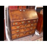 A Georgian mahogany fall front bureau with fitted