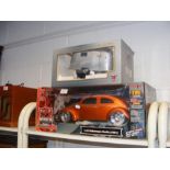 A Maisto 1951 Volkswagen Beetle die cast model veh