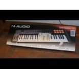 An M-Audio Oxygen 49 USB Midi Keyboard - in box