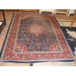 A Middle Eastern style rug with geometric border a