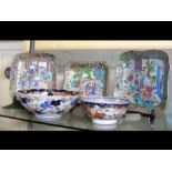 Three Famille Rose dishes together with an Imari bowl and one other