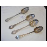 A pair of Georgian silver berry spoons, together w
