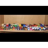 Selection of die cast model toys - on one shelf