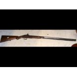 A 115cm long antique percussion rifle with engrave