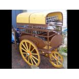 A manual driven milk float 'Essex farm dairy' 'Par