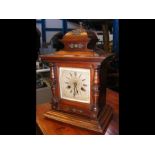 A 40cm high wooden cased mantel clock