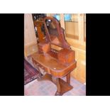 A Victorian mahogany Duchess dressing table