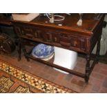 An oak two drawer sideboard with geometric drawer