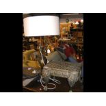 An elegant Ewer table lamp together with a pierced