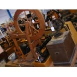 Two old Singer sewing machines and one other, toge