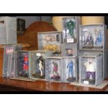 A selection of 12 boxed Marvel figures with stand