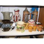 An assortment of character jugs and German steins,