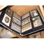 A photo album containing assorted vintage postcard