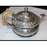 A small proportioned silver teapot with London hal