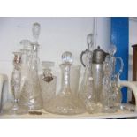 A cluster of cut glass decanters