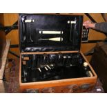 A vintage leather travelling vanity case