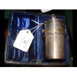 A silver Communion wine vessel in travelling case