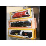 A boxed Bachmann locomotive and tender together wi