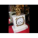 A Victorian mantel clock - 32cm high - with cherub