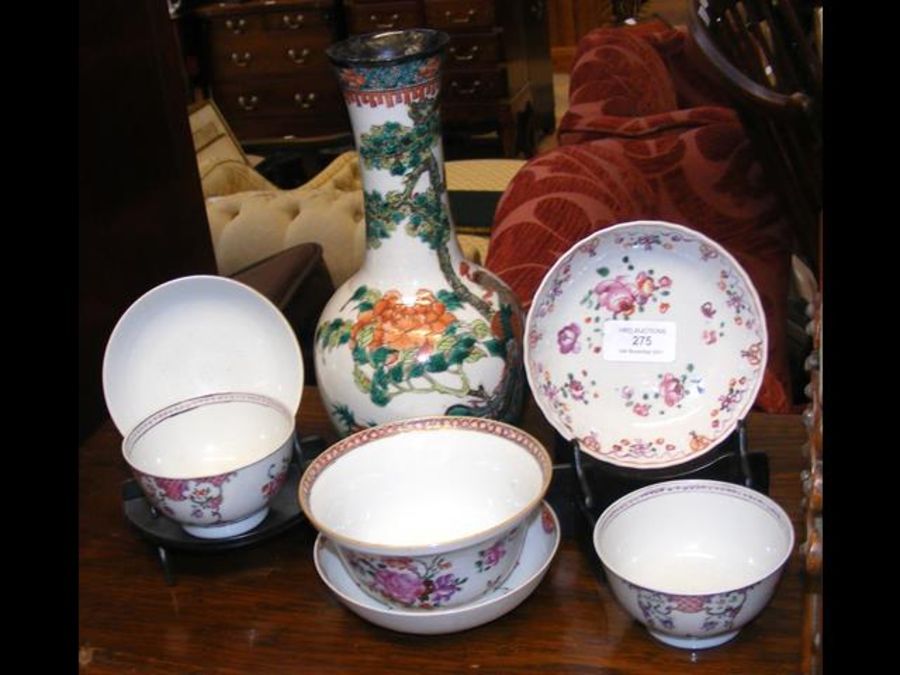 An oriental vase, tea bowl and saucer