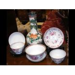 An oriental vase, tea bowl and saucer