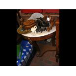 A Victorian half moon marble top wash stand with claw foot