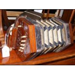 An antique Lachenal & Co. concertina with maker's