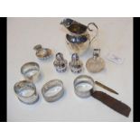 A silver cream jug, caddy spoon, etc.